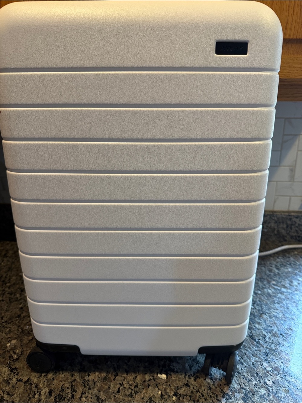 Away White Hard Shell Carry-On Spinner Luggage